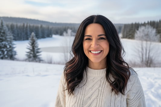 Woman wearing a natural-looking wig and cozy sweater during fall in Canada, smiling outdoors in Grande Prairie.